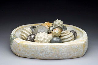 Ceramic bowl with spheres